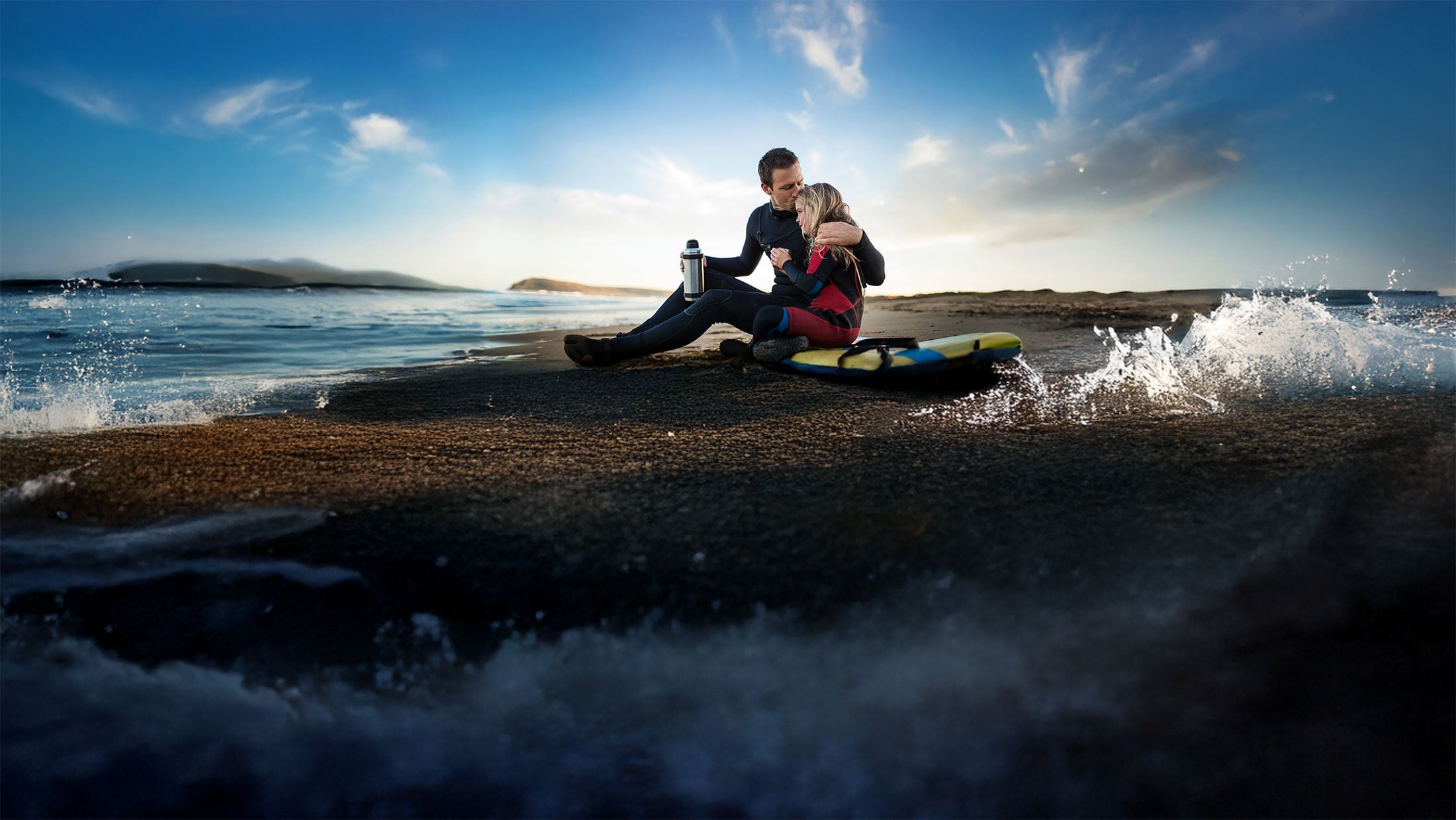 father and daughter on the beach