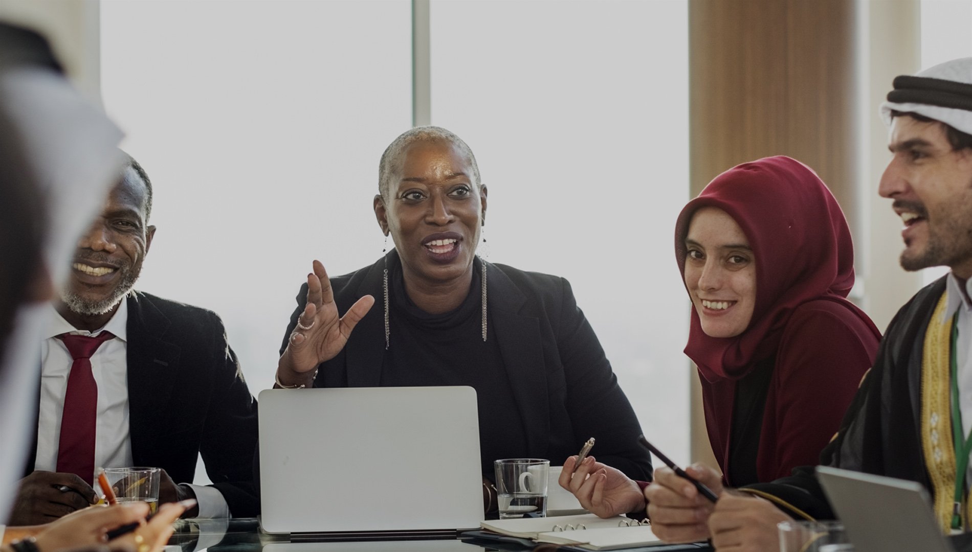 Woman leading a business meeting.
