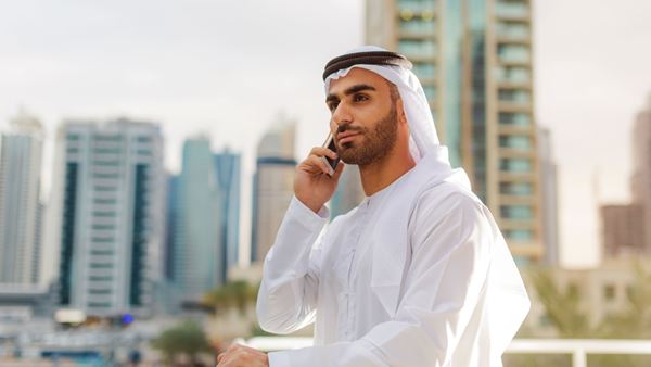 Man on phone in Dubai