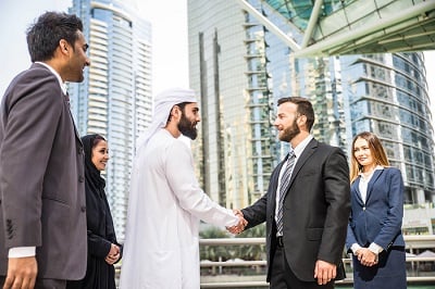 Two businessmen shaking hands.