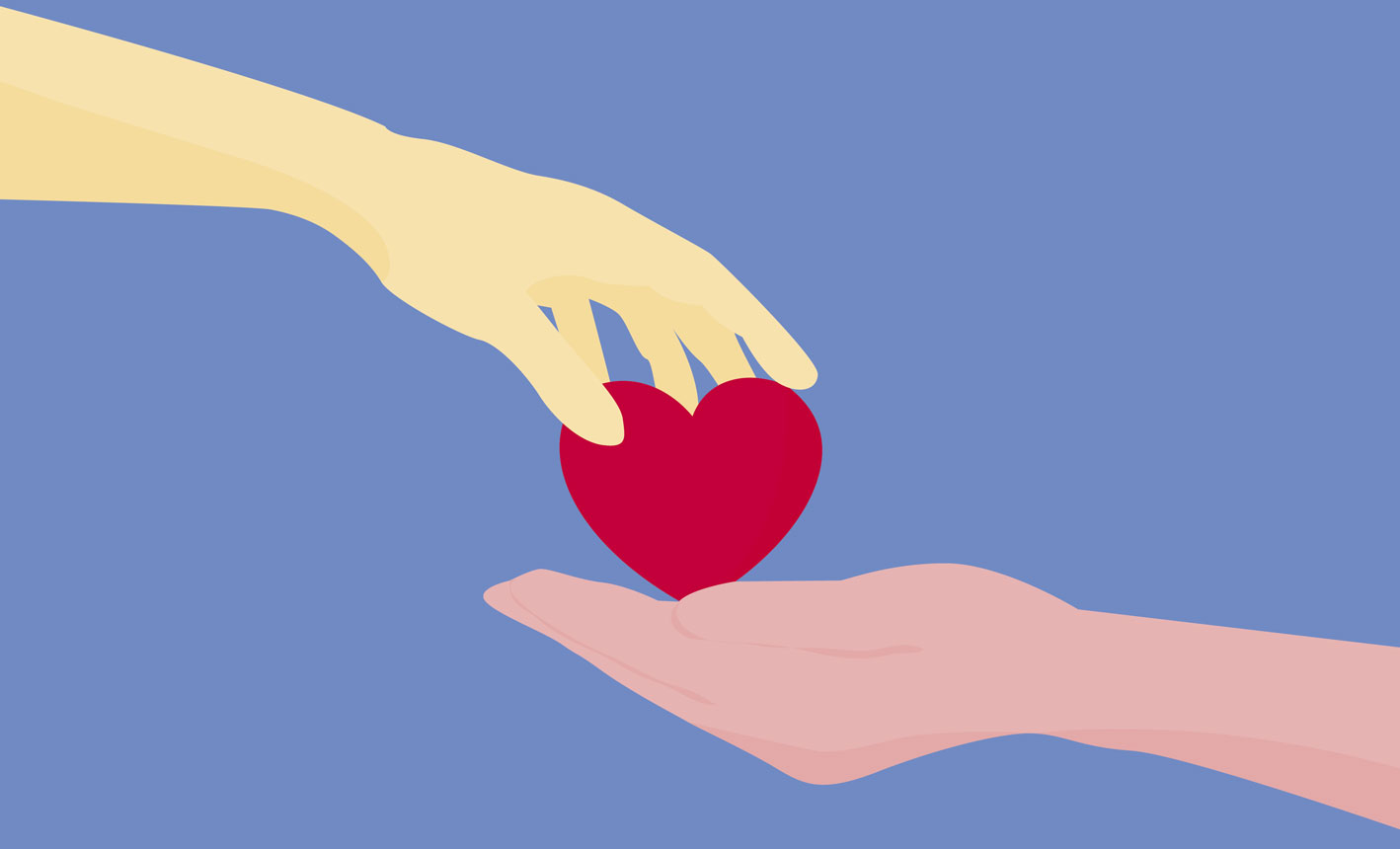 Hands holding a heart