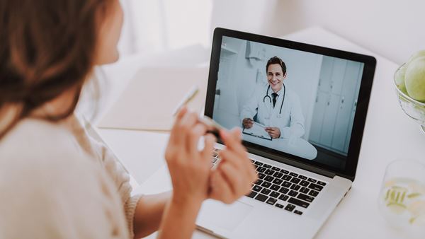 Woman talking to online doctor