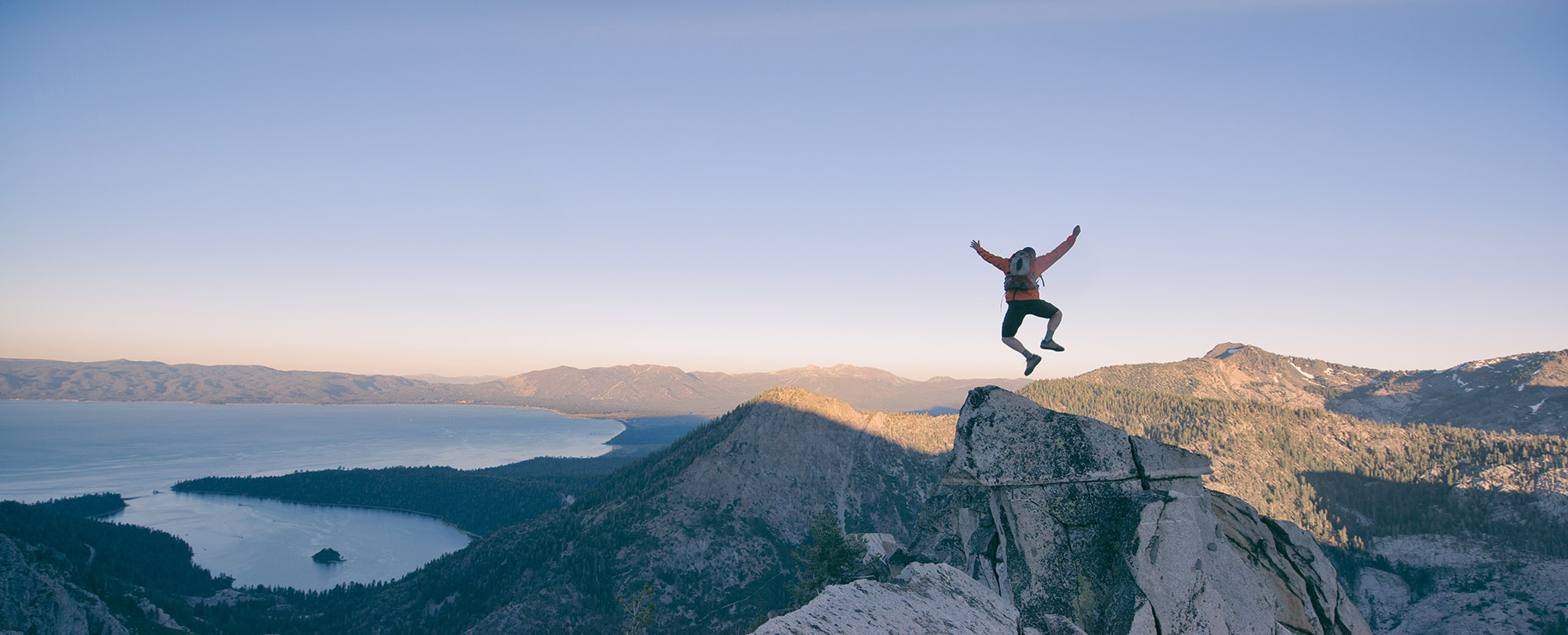 Man leaping on mountain