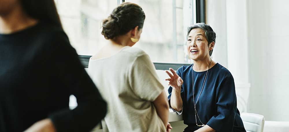 Business women in conversation