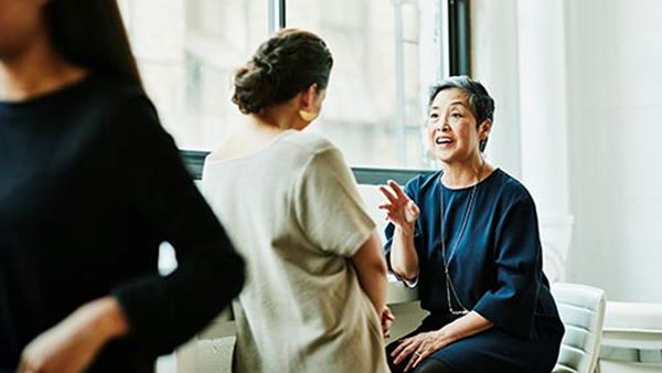 Business women in conversation
