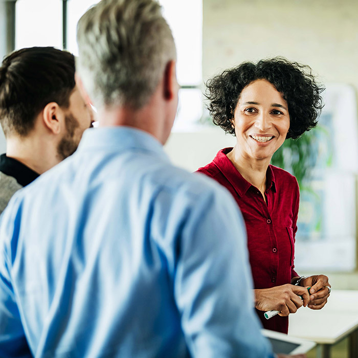 colleagues in an office, talking