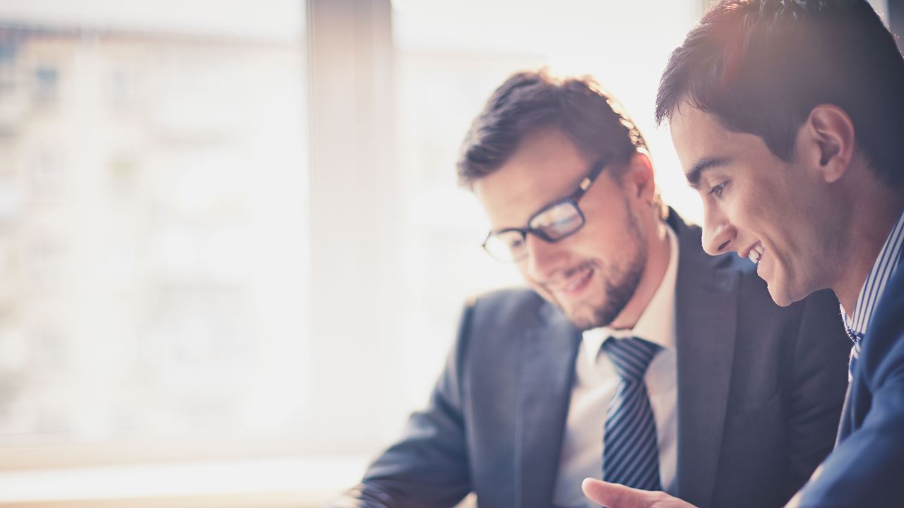 Two men in a meeting