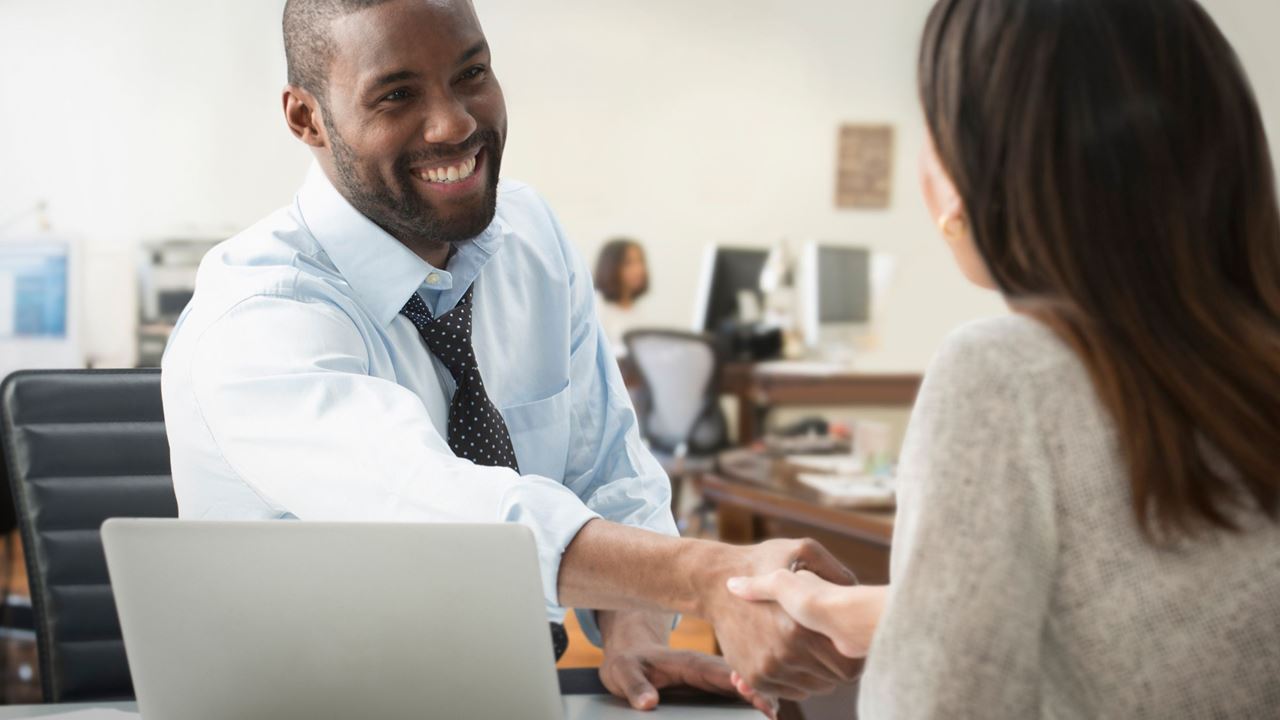 Man and woman in a meeting