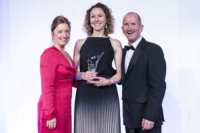 Rebecca Freer accepts the award on behalf of AXA's global healthcare team