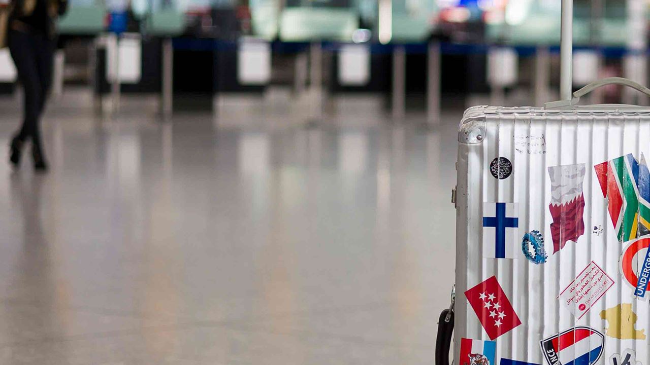 lonely luggage at airport terminal