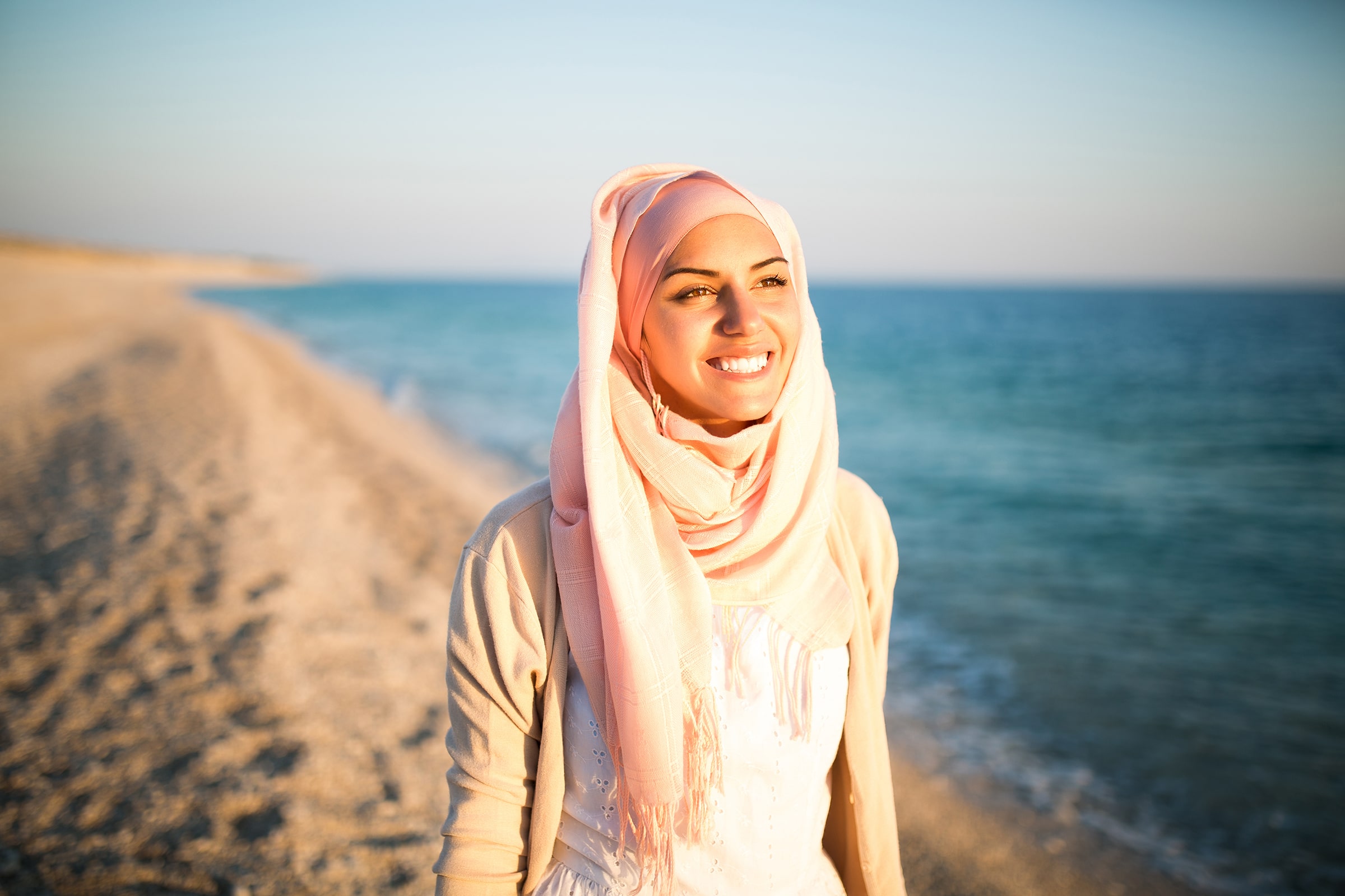 Smiling lady on the beach