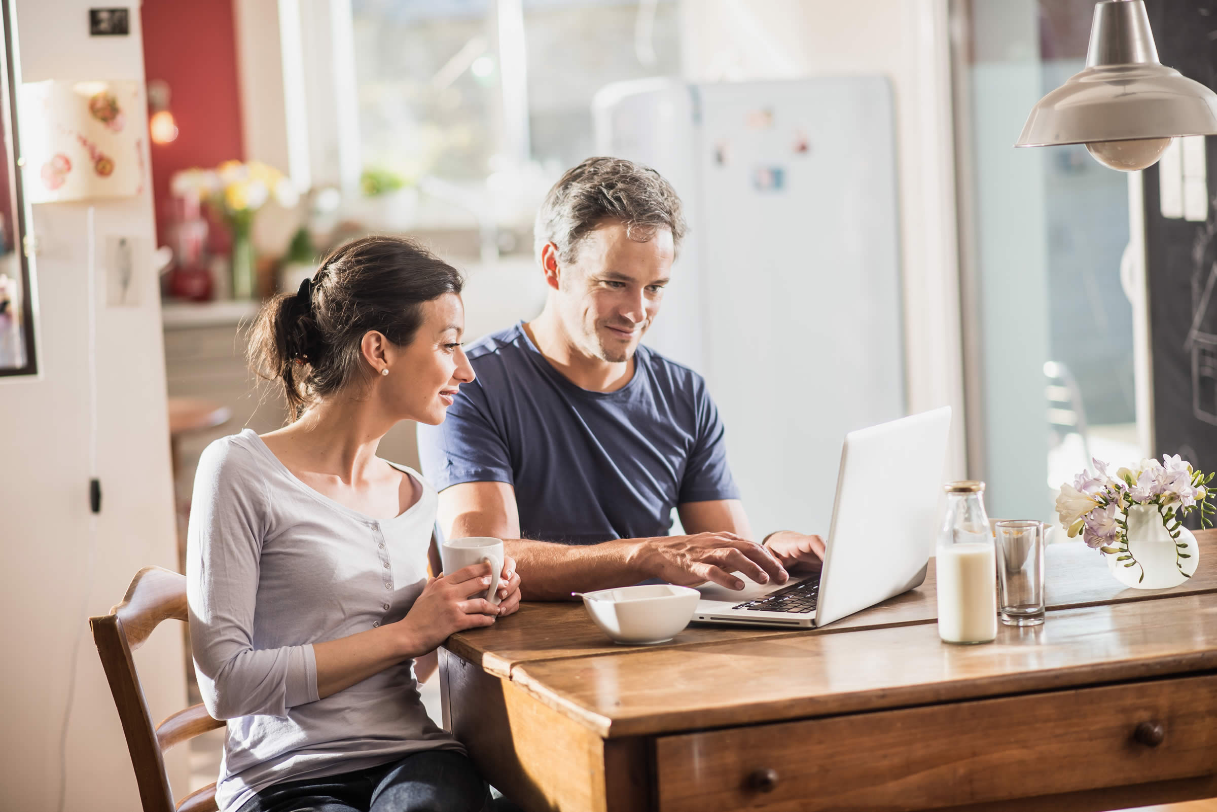 couple looking at laptop