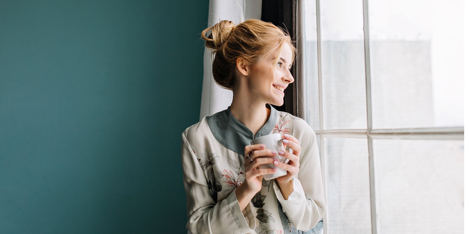 Lady by window