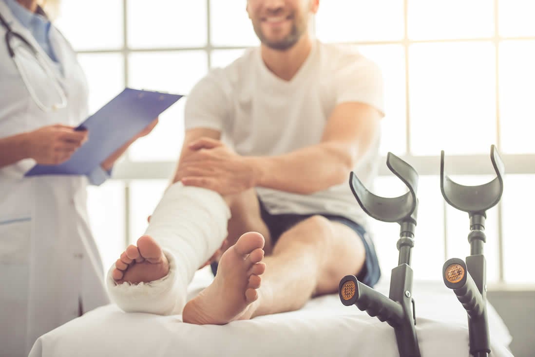 man with leg in cast