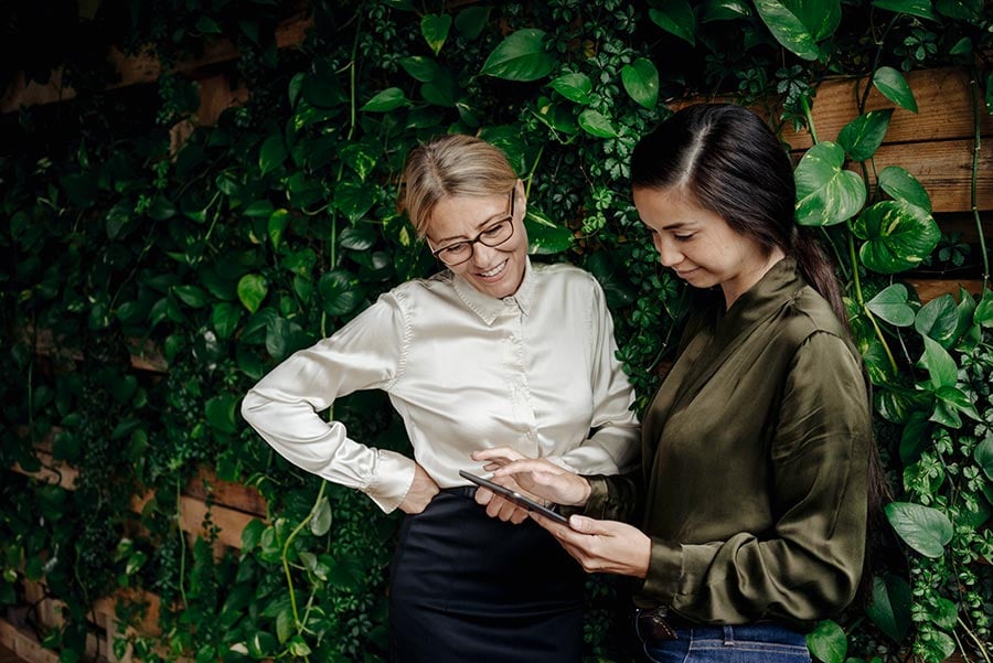 Two business women talking