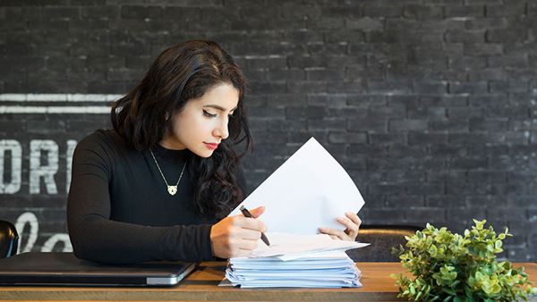 lady working through paperwork