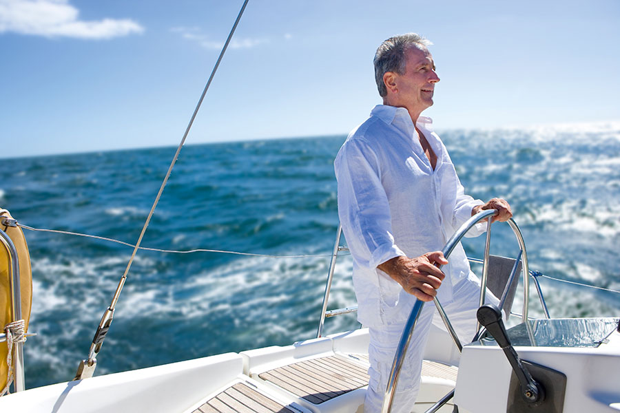 older man sailing on sea