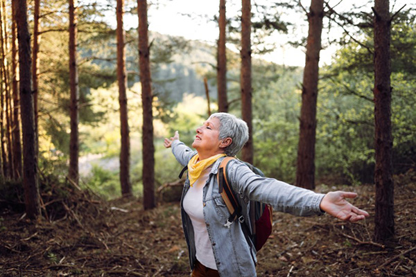 elder lady embracing wildlife