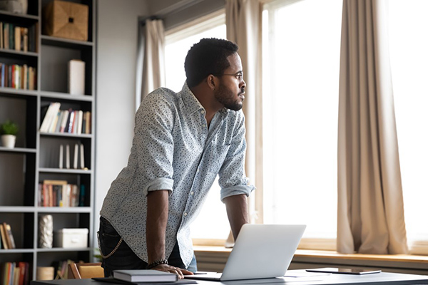 man working in home office