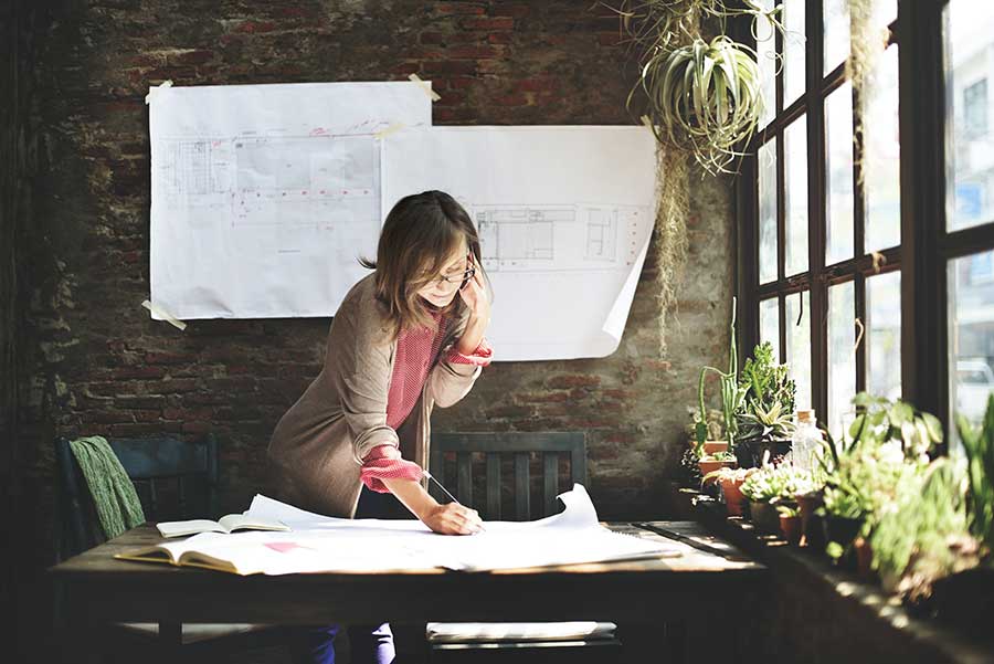 lady working near a window