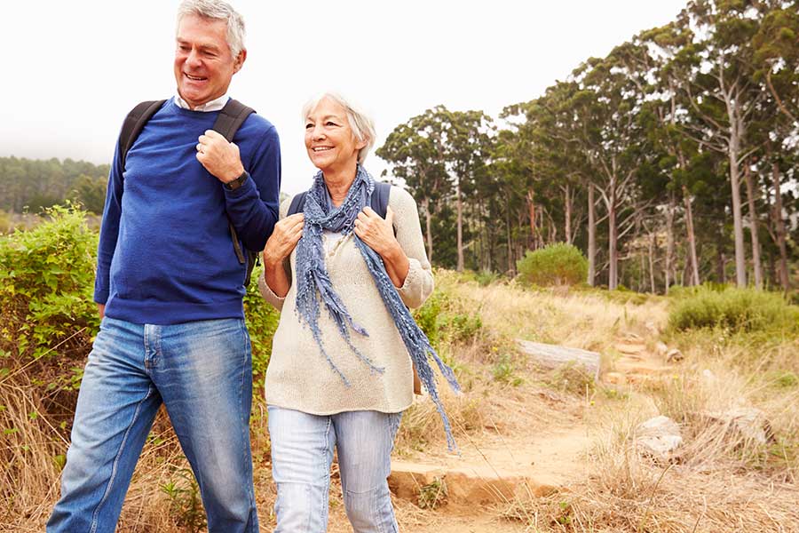 elderly couple walking