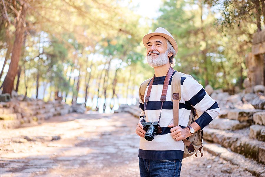 man walking in a wood