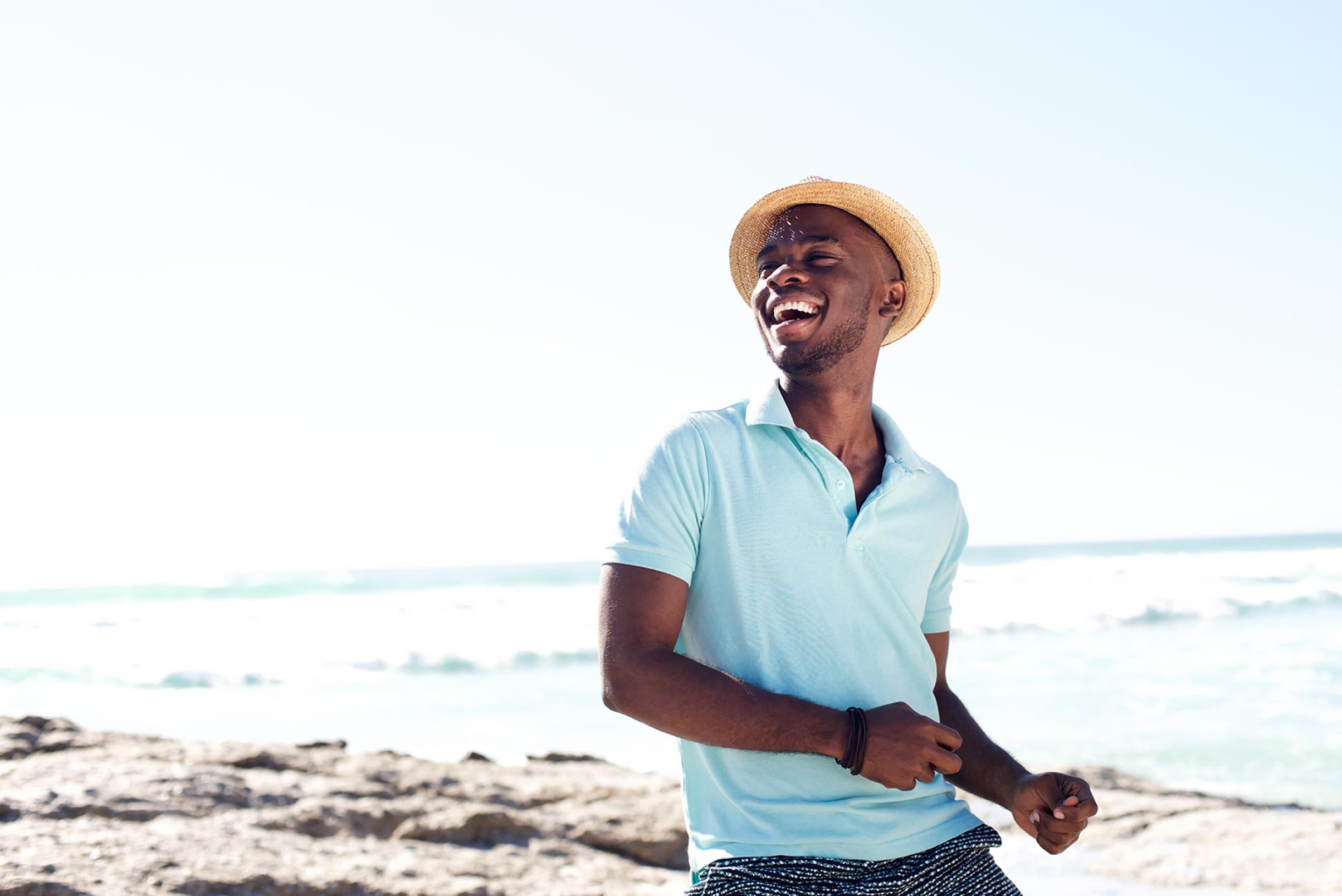 Man on beach smiling