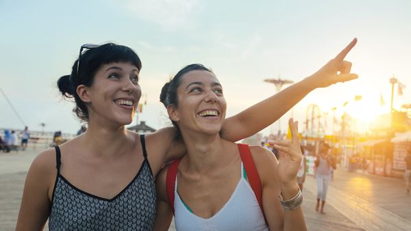 Two women smiling in the sunshine