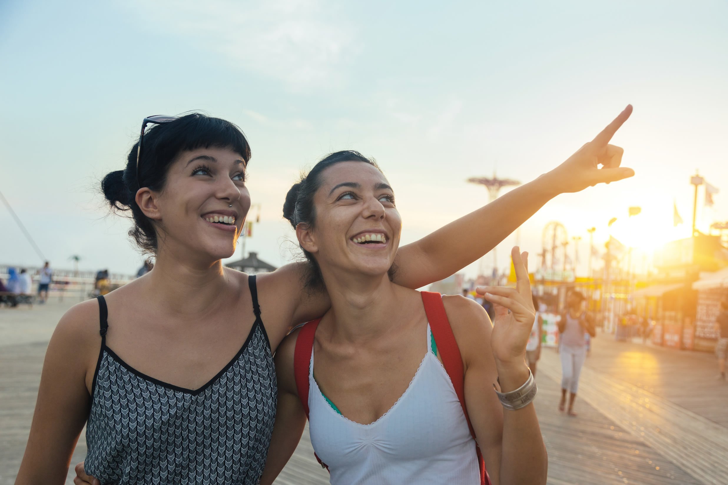 Two women smiling in the sunshine