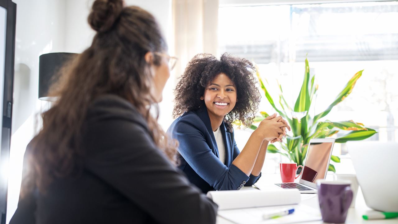 Women talking at work