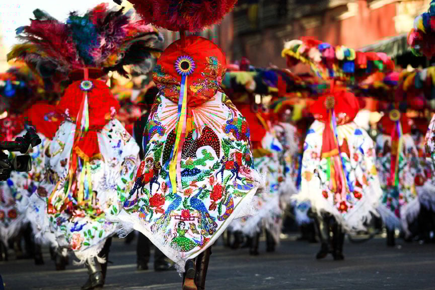 Mexican carnival goers in traditional dress
