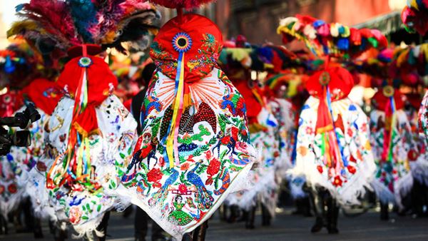 Mexican carnival goers in traditional dress