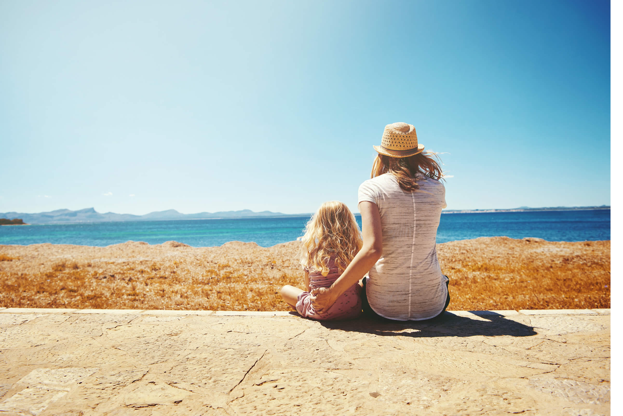 Woman sat on a beach