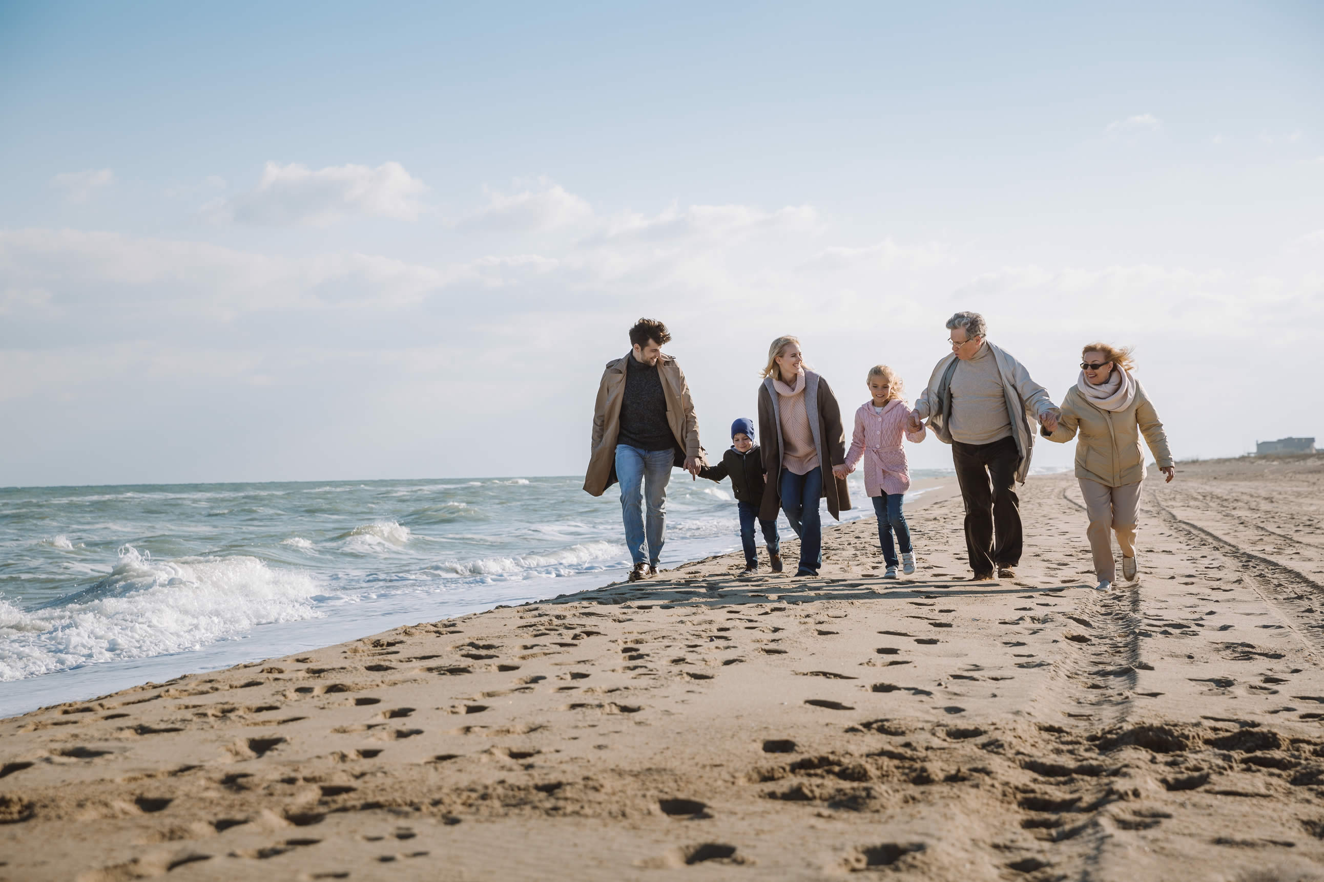 Family walking on the beach