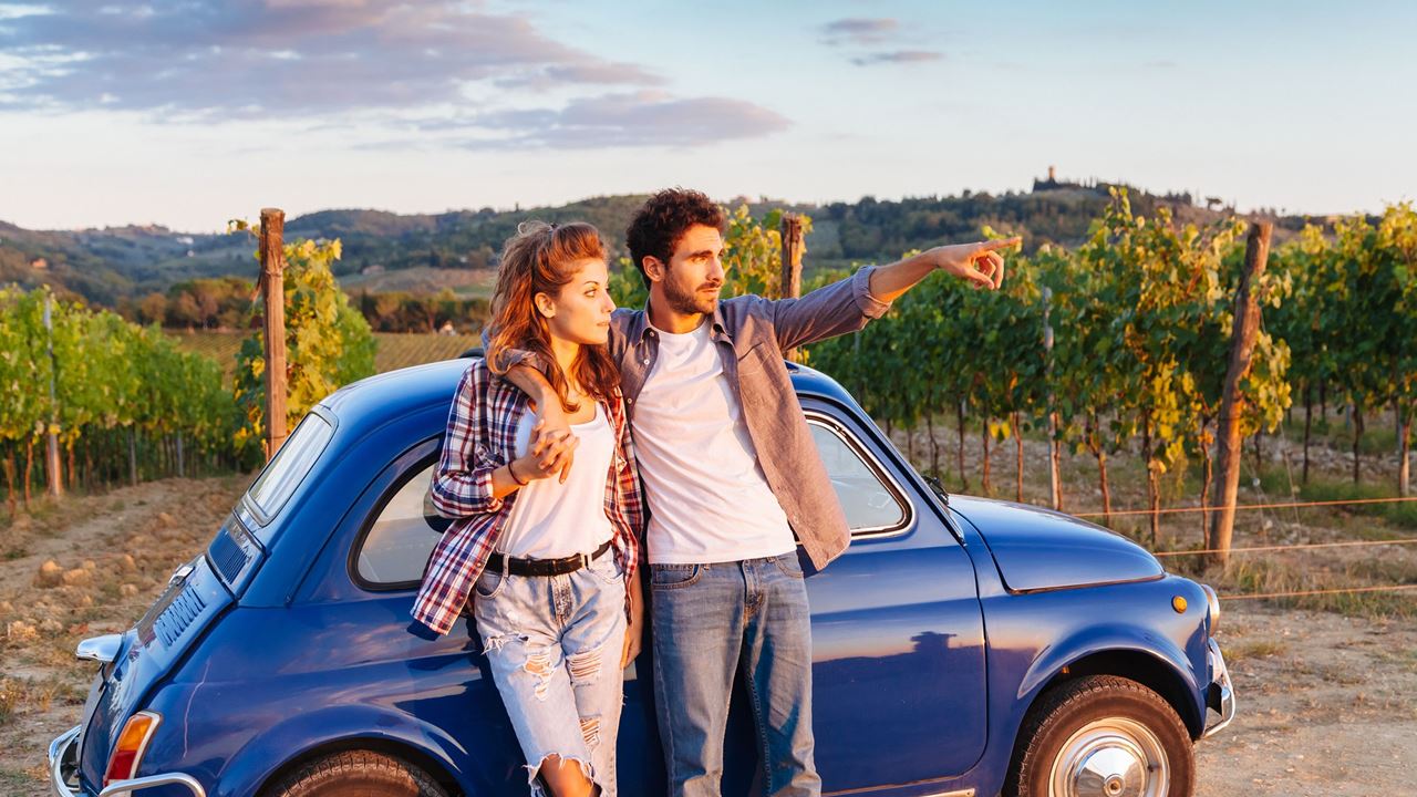 young couple with car