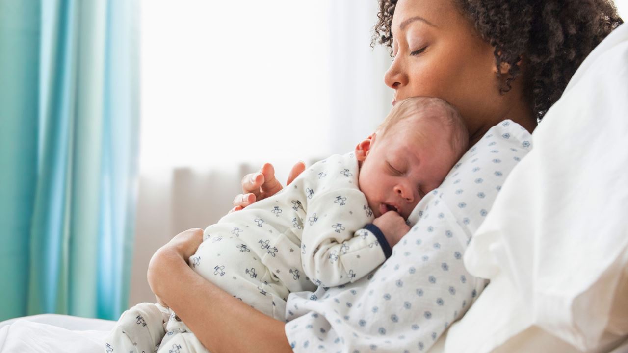 mum and baby cuddle